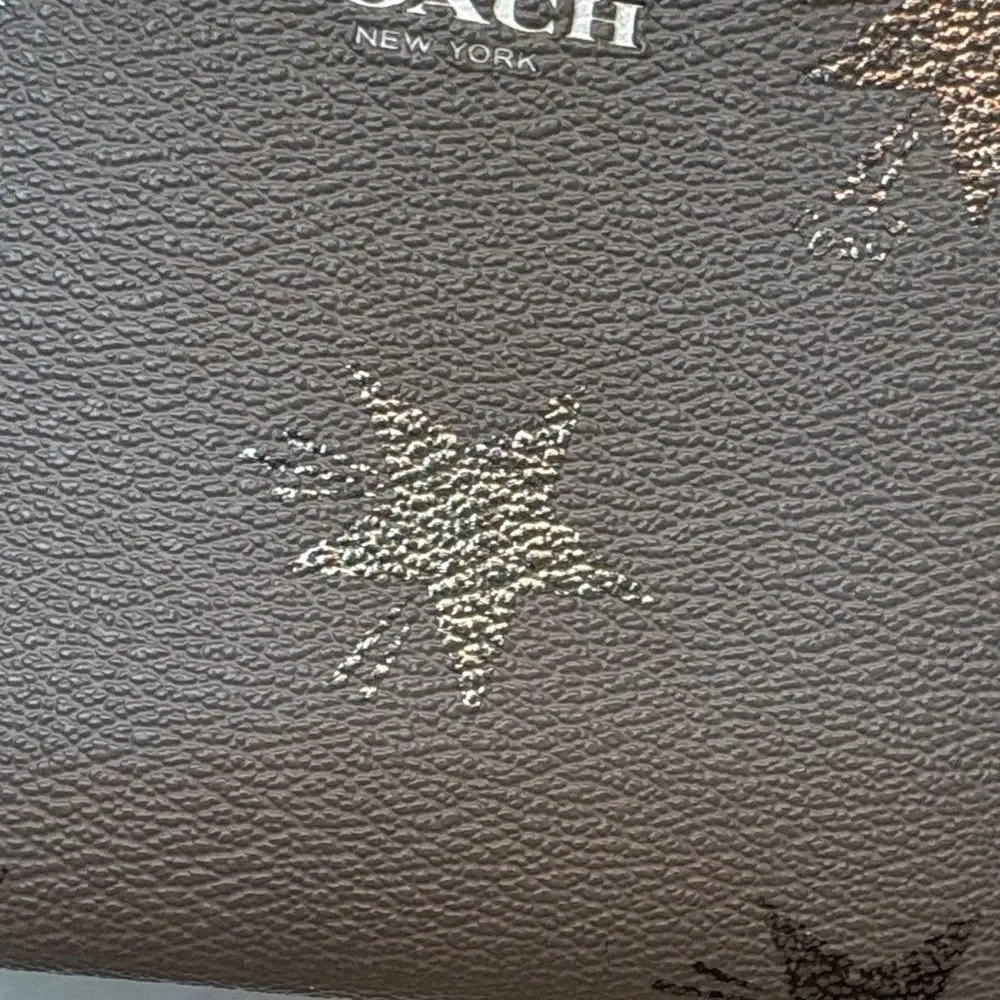 Coach Saffiano Leather Metallic Silver Star-Pattern Wristlet